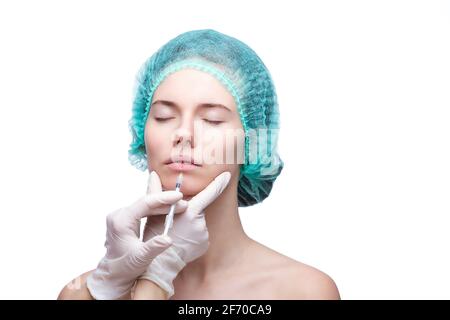 Portrait of young Caucasian woman getting cosmetic injection Stock Photo