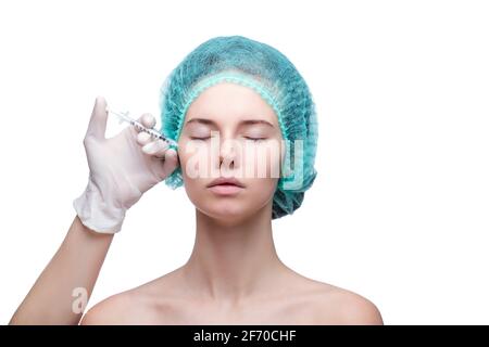Portrait of young Caucasian woman getting cosmetic injection Stock Photo