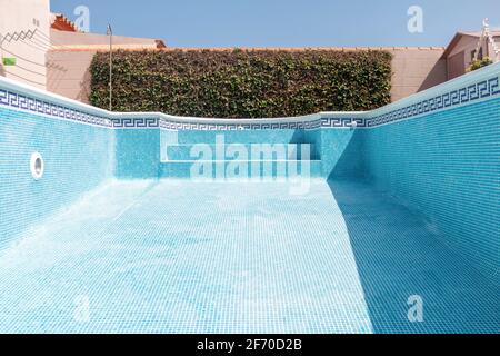 Image taken from inside an empty swimming pool Stock Photo