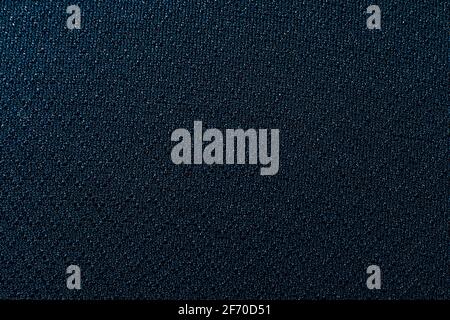 Polyester fabric background high-resolution texture in dark blue or teal Stock Photo
