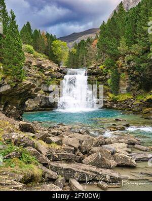 Gradas de Soaso waterfall in Ordesa y Monte Perdido National Park, in the Aragonese Pyrenees, located in Huesca, Spain. View Stock Photo