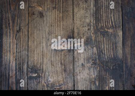 Stylish old dirty shabby wooden boards on the floor. Beautiful original wood texture. Stock Photo