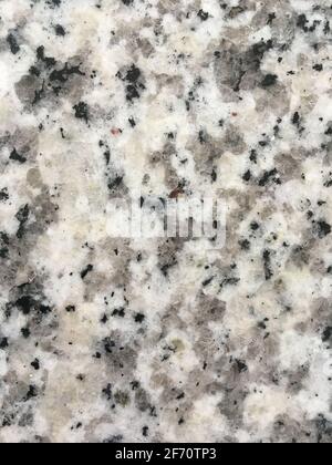 Polished grey and white granite stone texture background Stock Photo
