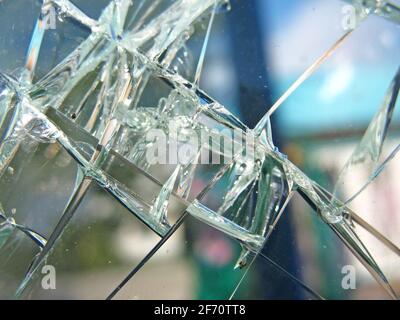 The texture of broken glass with cracks. High quality photo Stock Photo