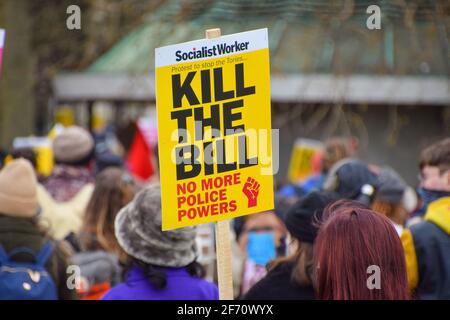 A protester holds a placard that says Kill The Bill during the march in Hyde Park.Thousands of people marched through Central London to protest against the Police, Crime, Sentencing and Courts Bill.