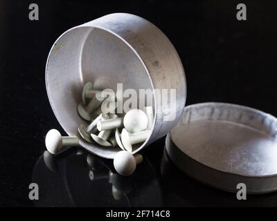 Rivets in an aluminium container on black background. Stock Photo