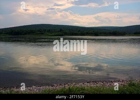 Panoramic views on the river in Siberia during a warm summer evening. Stock Photo