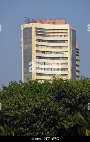 View of the tower block headquarters of the Bombay Stock Exchange in Mumbai, India. Viewed from Maidan Oval. . Stock Photo