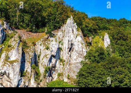 Crown rocks - Skaly Koronne - Jurassic massif with Glove Rock - Rekawica - in Pradnik creek valley of Cracow-Czestochowa upland in Ojcow in Poland Stock Photo