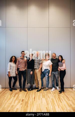 Full length portrait of a diverse group of business people in office. business team standing together for a portrait. Stock Photo