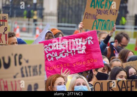 London, United Kingdom. 3rd April 2021. Hundreds of demonstrators gathered at Parliament Square for The 97% March to protest against harassment of women. Stock Photo