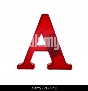 Plastic letter A on magnet isolated on white background, top view Stock Photo