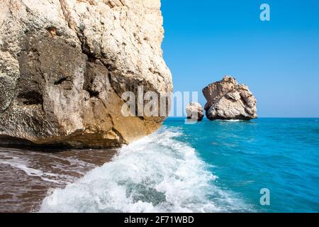 A beautiful summer landscape of a beach and  Aphrodite's Rock on the Cyprus island Stock Photo