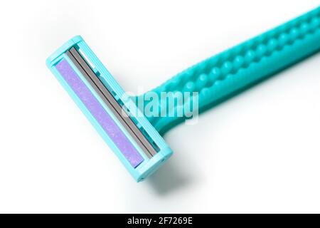 Cyan disposable razors isolated on white background. Stock Photo