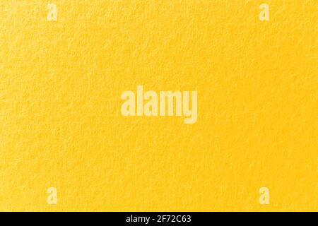 Amber orange texture, paper surface background close-up Stock Photo