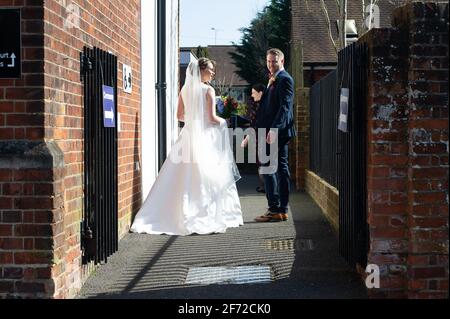 Beaconsfield, Buckinghamshire, UK. 4th April, 2021. Olivia Joy and Thomas  Moll got married this Easter Sunday morning at Beaconsfield Old Town Registry  Office. Although weddings are allowed again in England, the number
