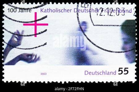 MOSCOW, RUSSIA - DECEMBER 22, 2020: Postage stamp printed in Germany shows Hands and women, circa 2003 Stock Photo
