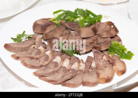Horse meat on a plate horse meat sausage delicacy from asia Stock Photo