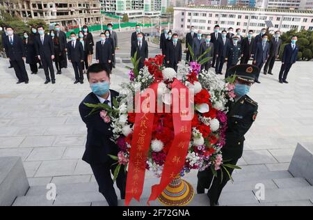 Pyongyang. 4th Apr, 2021. A flower basket is presented by the Chinese embassy in honour of martyrs of the Chinese People's Volunteers (CPV) at the Friendship Tower in Pyongyang, the Democratic People's Republic of Korea, April 4, 2021, on the occasion of Qingming Festival. Credit: Jiang Yaping/Xinhua/Alamy Live News Stock Photo