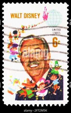 MOSCOW, RUSSIA - DECEMBER 22, 2020: Postage stamp printed in United States shows Walt Disney (1901-1966) and Children of the World, serie, circa 1968