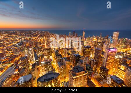 Chicago, Illinois USA aerial skyline towards Lake Michigan just after sunset. Stock Photo