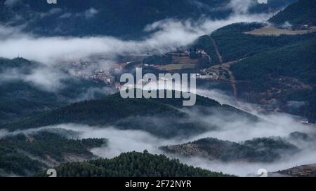 Llobregat valley and Guardiola de Berguedà among morning fogs, seen from the Devesa viewpoint, in Coll de Pal (Catalonia, Spain, Pyrenees) Stock Photo