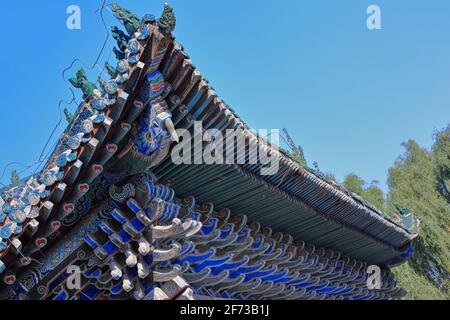Timber framework-polychrome beams-ridge beasts-SE.roof corner-Art Exhibition Hall. DafoSi-Great Buddha Temple-Zhangye-Gansu-China-1274