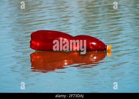 Plastic bottle floating on the surface of the river plastic waste Stock Photo