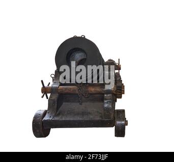 Ancient cannon on wheels isolated on white background with clipping path. Copy space, no shadows Stock Photo