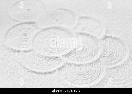 Zen pattern in white sand Stock Photo