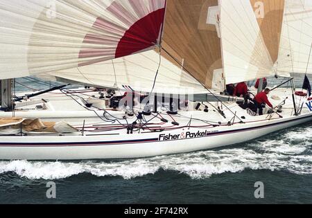 AJAXNETPHOTO. 1989. SOLENT, ENGLAND. FASTNET RACE 1989 - FISHER AND PAYKEL (NZ) OFF THE NEEDLES. YACHT IS A WHITBREAD RACE ENTRY. PHOTO : JONATHAN EASTLAND / AJAX REF:890209 35 Stock Photo