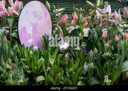 New York, United States. 03rd Apr, 2021. Easter garden with lilies, tulips, daffodils, daisies, bluebells flowers opened at Rockefeller Center in New Yokr, on April 3, 2021. Metallic Easter eggs and Easter bunnies installed throughout the plant beds. (Photo by Lev Radin/Sipa USA) Credit: Sipa USA/Ģ����ý Live News Stock Photo