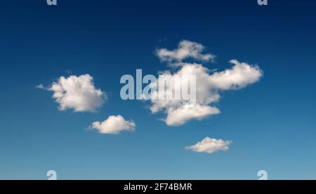Deep blue sky with few clouds Stock Photo