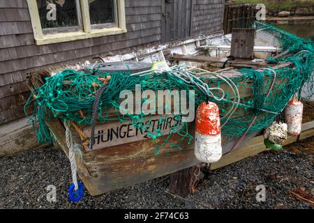 Wooden Boat, Fishing Village of Peggy's Cove in the Rain, Nova Scotia, Canada Stock Photo