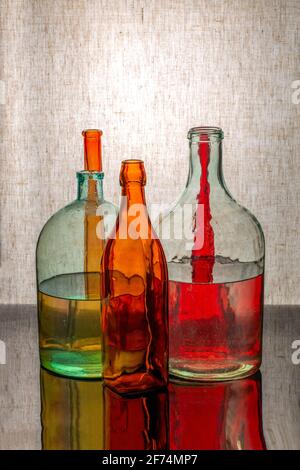 Still life with glassware on a reflective surface Stock Photo