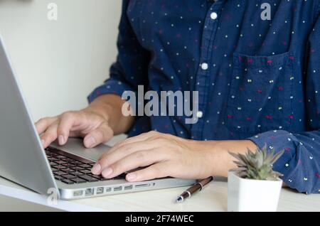 business man typing on keyboard computer laptop. Stock Photo