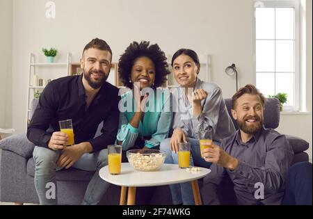 Bunch of happy millennial friends spending weekend together and having good time Stock Photo