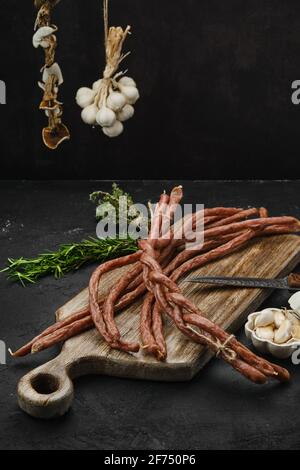 Long thin homemade beef sausages with garlic Stock Photo