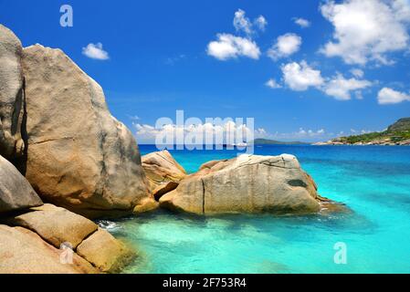 Big granite stones on the tropical beach, Coco Island, Indian ocean, Seychelles. Exotic destinations. Stock Photo
