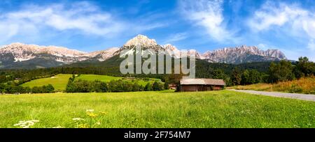 Mountain Farm in front of Wilder Kaiser, Kitzbühel, Tyrol, Austria Stock Photo