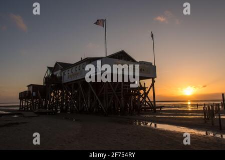 Seafood place in a typical stilt house at the beach of St. Peter-Ording Stock Photo