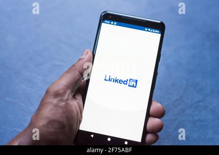 LinkedIn business network app loading on android smartphone Stock Photo