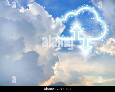 Cloud computing technology concept. Cloud digital storage icon with up and down arrows on blue sky background with copy space. Data network online ser Stock Photo