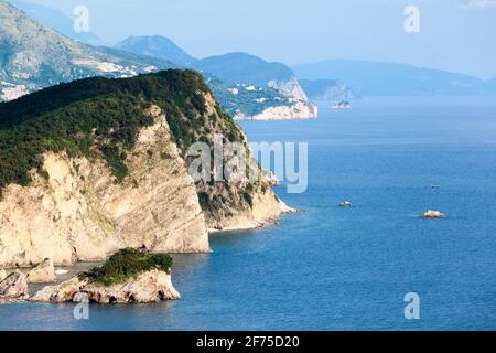 The attractive Island Sveti Nikola popularly named Hawaii near Budva, is one of the top attractions of Budva Riviera. Montenegro, Europe Stock Photo