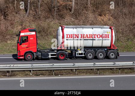 Den Dartogh Volvo FH truck with tank container on motorway. Stock Photo