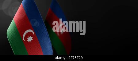 Small national flags of the Azerbaijan on a dark background Stock Photo