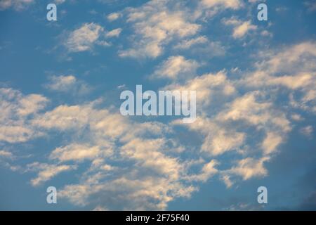 Clouds seen against the blue sky on an early morning. Stock Photo