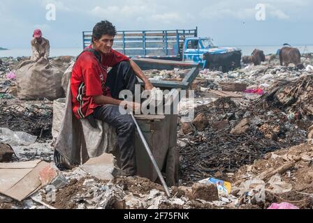 Managua, Nicaragua. 03-23-2019. Man having a rest while working in the garbage dump La Cuheka in the city of Managua. Stock Photo