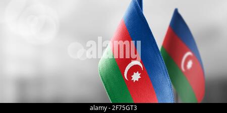 Small national flags of the Azerbaijan on a light blurry background Stock Photo