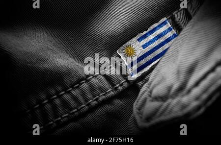 Tag on dark clothing in the form of the flag of the Uruguay Stock Photo